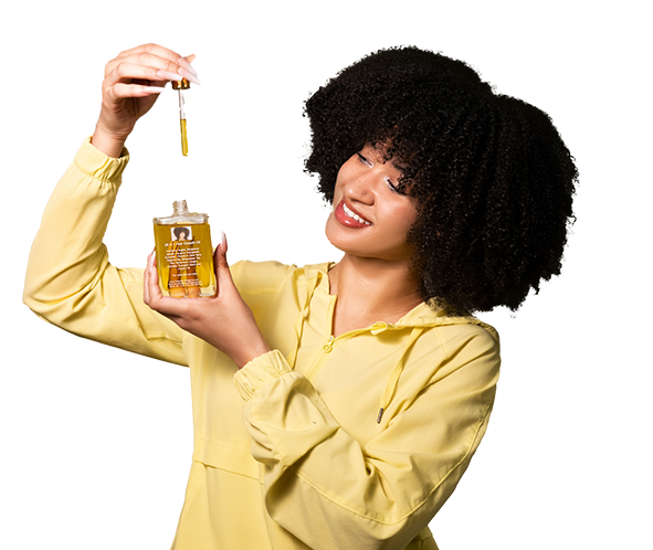 Woman using the hair oil product